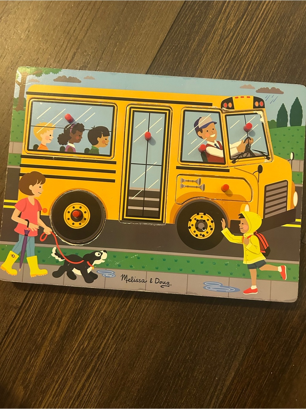 Melissa & Doug see and hear wheels on the bus song puzzle